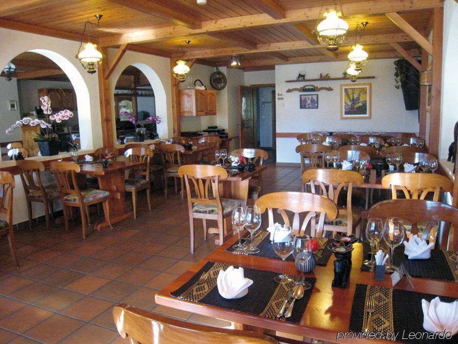 אוברוואלד Hotel Alpenhof מסעדה תמונה